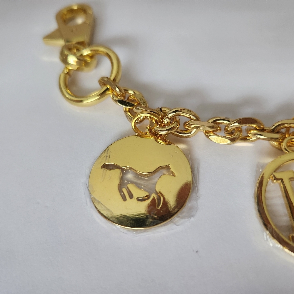 Hermès Gold Purse Charm Or Keychain. 8" Goldtone. - Picture 2 of 7